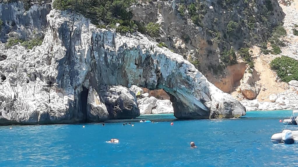 Sardinia Resort for Sale — Over 900 Rooms 6 Sardinia: the natural arch of Cala Goloritzé over the blue sea