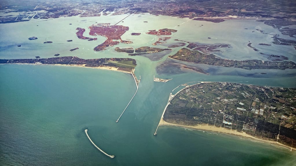 Venice hotel for sale: the lagoon, the city and the Lido shot from above towards the Adriatic