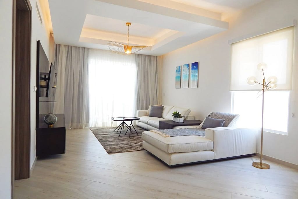 Buy property in the Dominican Republic: 12 questions before you sign 3 Buy property in the Dominican Republic: bright living room of a residence in Bávaro
