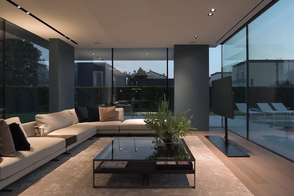 Chi siamo 10 Chi siamo, Elite Luxury Real Estate: open space con vetrate a tutta altezza, progetto dello studio