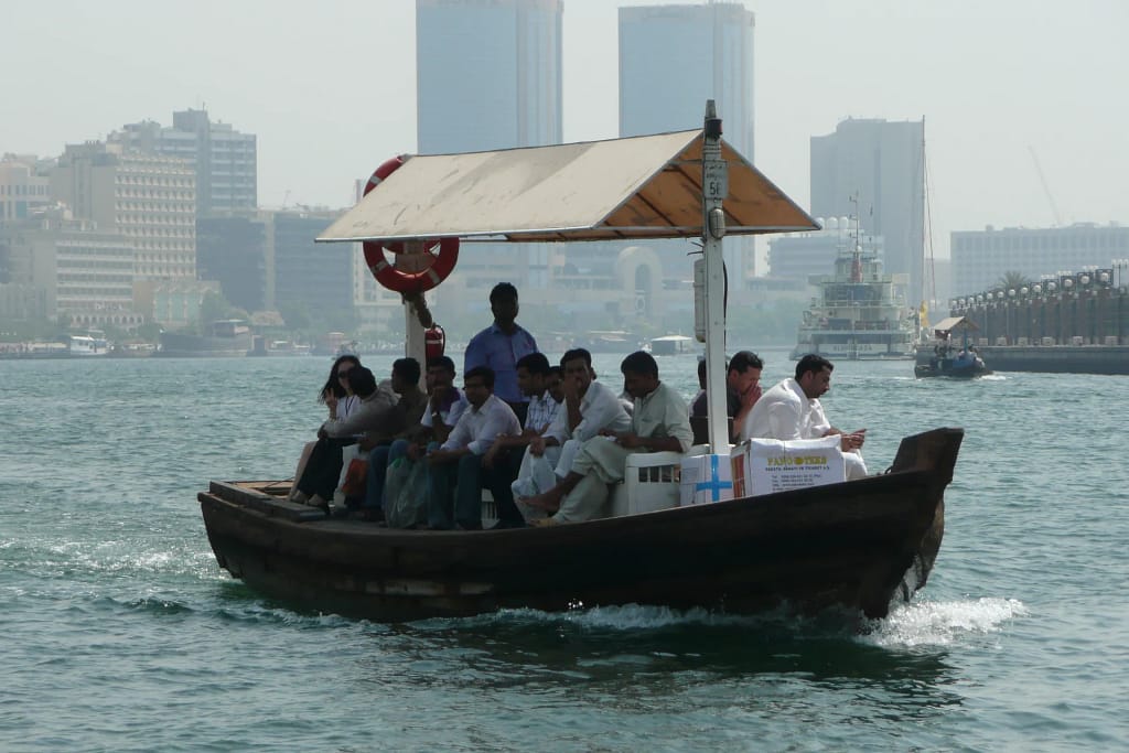 Dubai travel: an abra with passengers on Dubai Creek