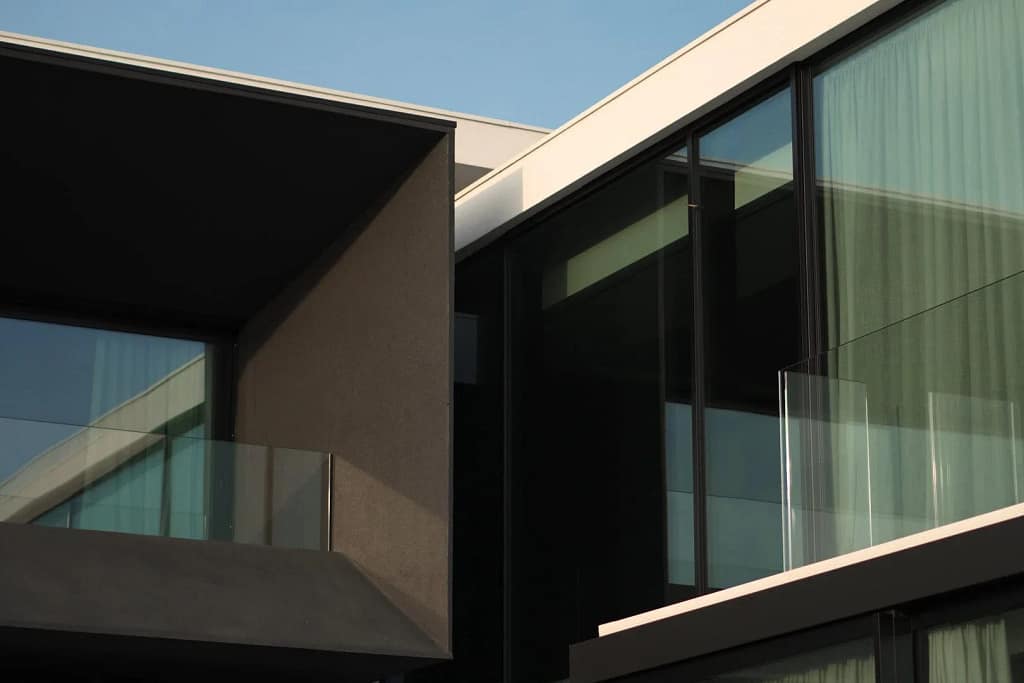 Luxury Windows — Glazing and Doors 4 Glazed facade framed by black volumes, a project by Federico Cappellina's studio