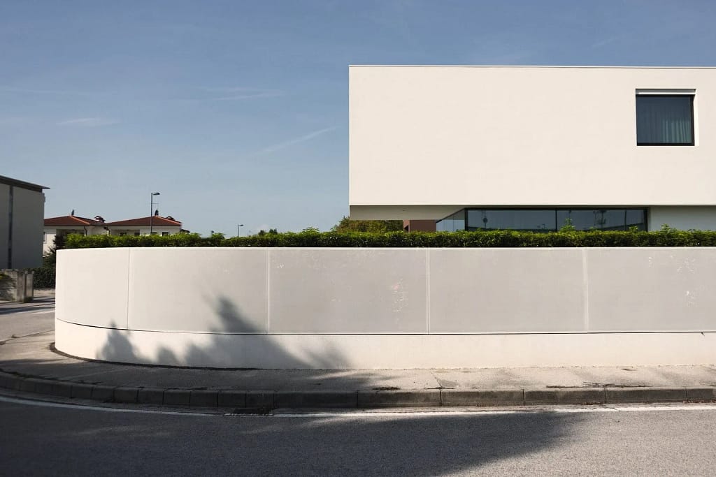 Home automation for villas: white boundary wall of the villa