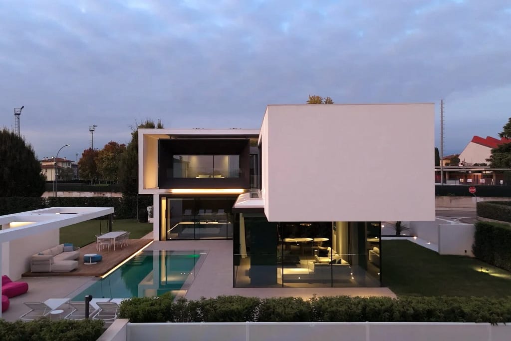 Made in Italy 2 Infinity pool lit at dusk, a project by the Federico Cappellina studio