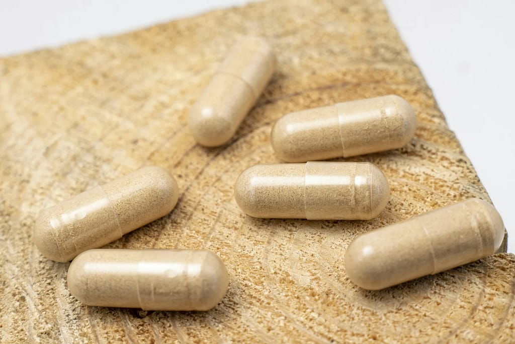 Longevity Supplements 3 Longevity supplements: capsules on linen fabric