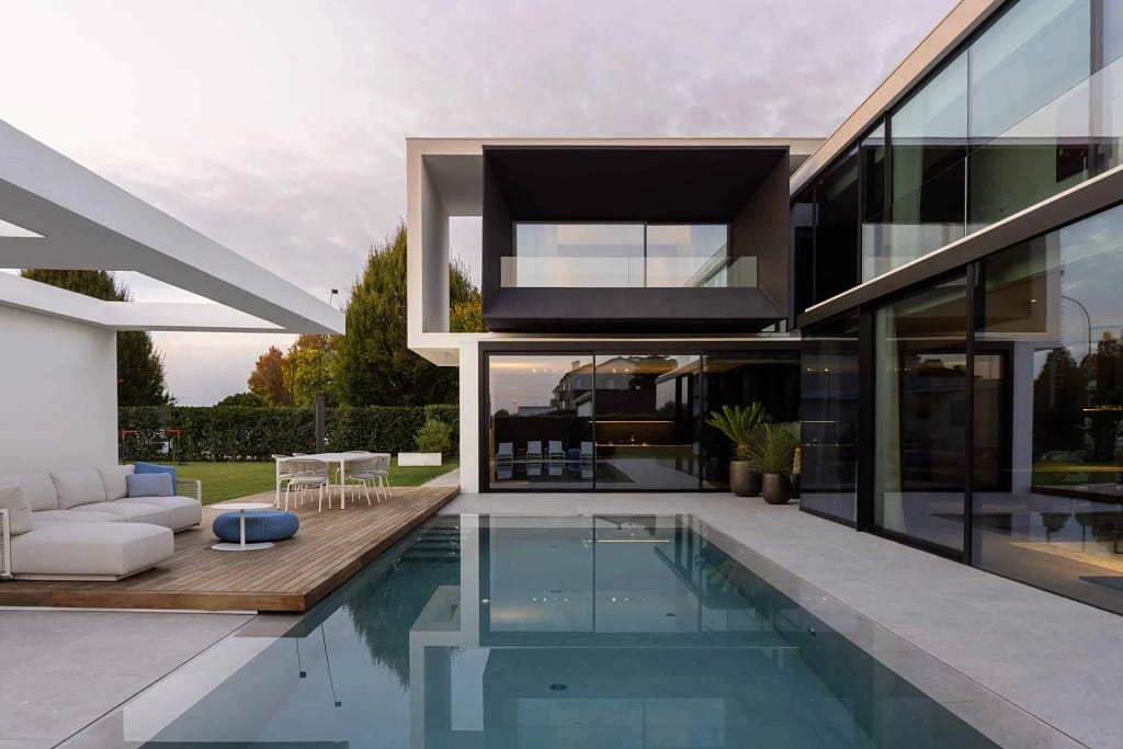 Partner Network — Luxury Real Estate Agencies & Certified Builders 3 Luxury real estate partner network: minimalist villa with pool, studio project
