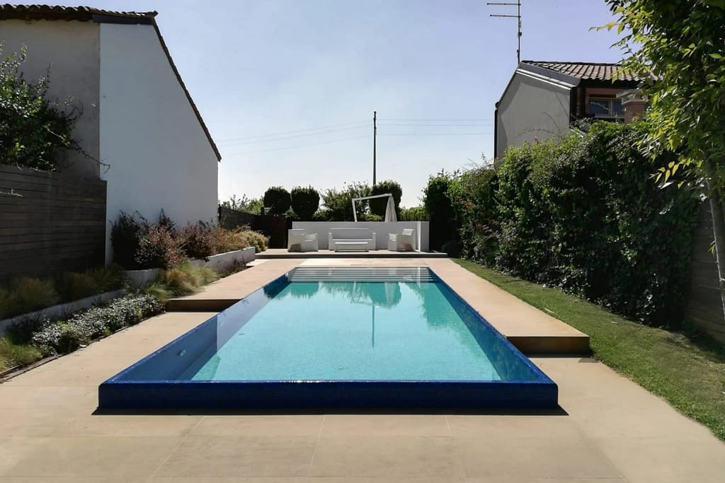 Partner Network — Luxury Real Estate Agencies & Certified Builders 4 Luxury real estate partner network: pool and garden of a studio villa