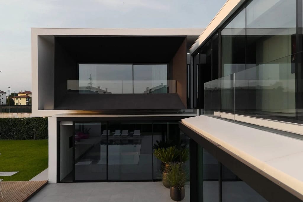 Luxury Windows — Glazing and Doors 3 Luxury windows: glazing and black volumes above the pool