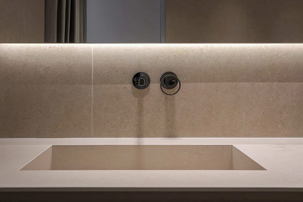 Made in Italy 34 Made in Italy stone: flush stone basin with grazing light, a project by the Federico Cappellina studio