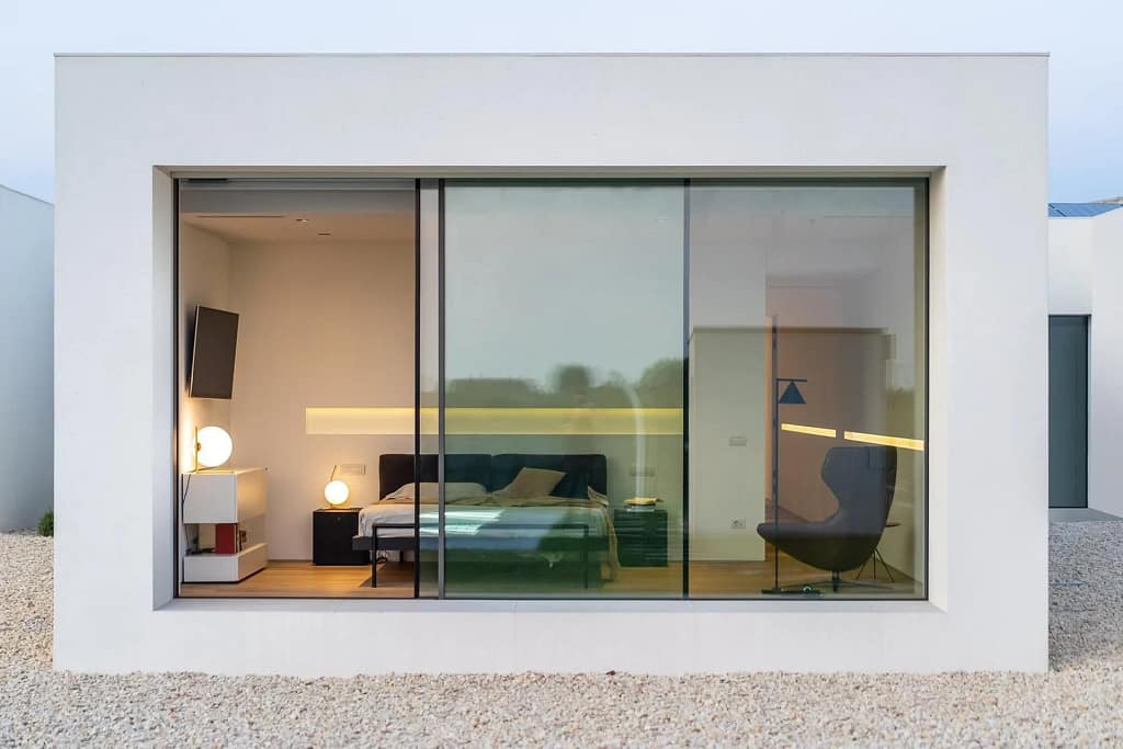 Longevity & Biohacking Lifestyle — UHNW Hub 6 Minimal master bedroom open to the greenery