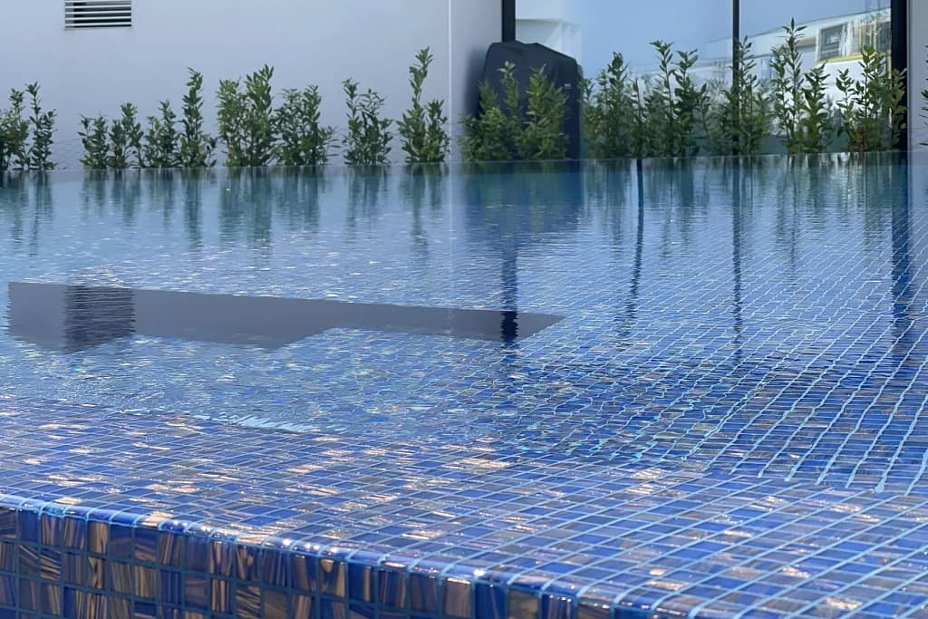 New Developments 3 New luxury real estate developments: pool mosaic at Lugana Bay, a specification detail