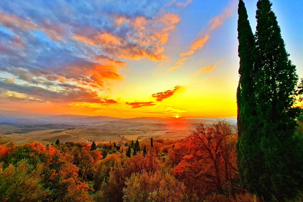 Ville di lusso in Toscana: la guida dell'architetto per sceglierle, affittarle o comprarle 6 Tramonto autunnale a Pienza, in provincia di Siena