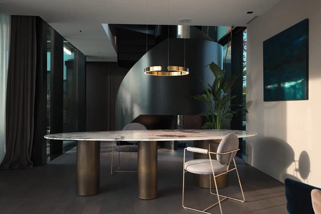 Il metodo 16 Valutazione architettonica dei materiali: tavolo in marmo sotto la lampada ad anello