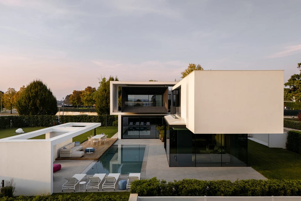 Longevity & Biohacking Lifestyle — UHNW Hub 5 Villa with a pool in the evening, outdoor wellness