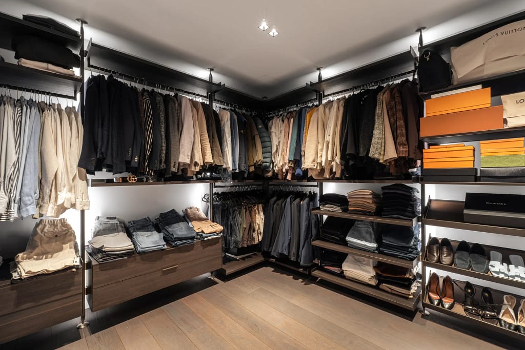 Luxury Fashion by Destination — UHNW Style 24 Walk-in closet of a luxury villa designed by the studio