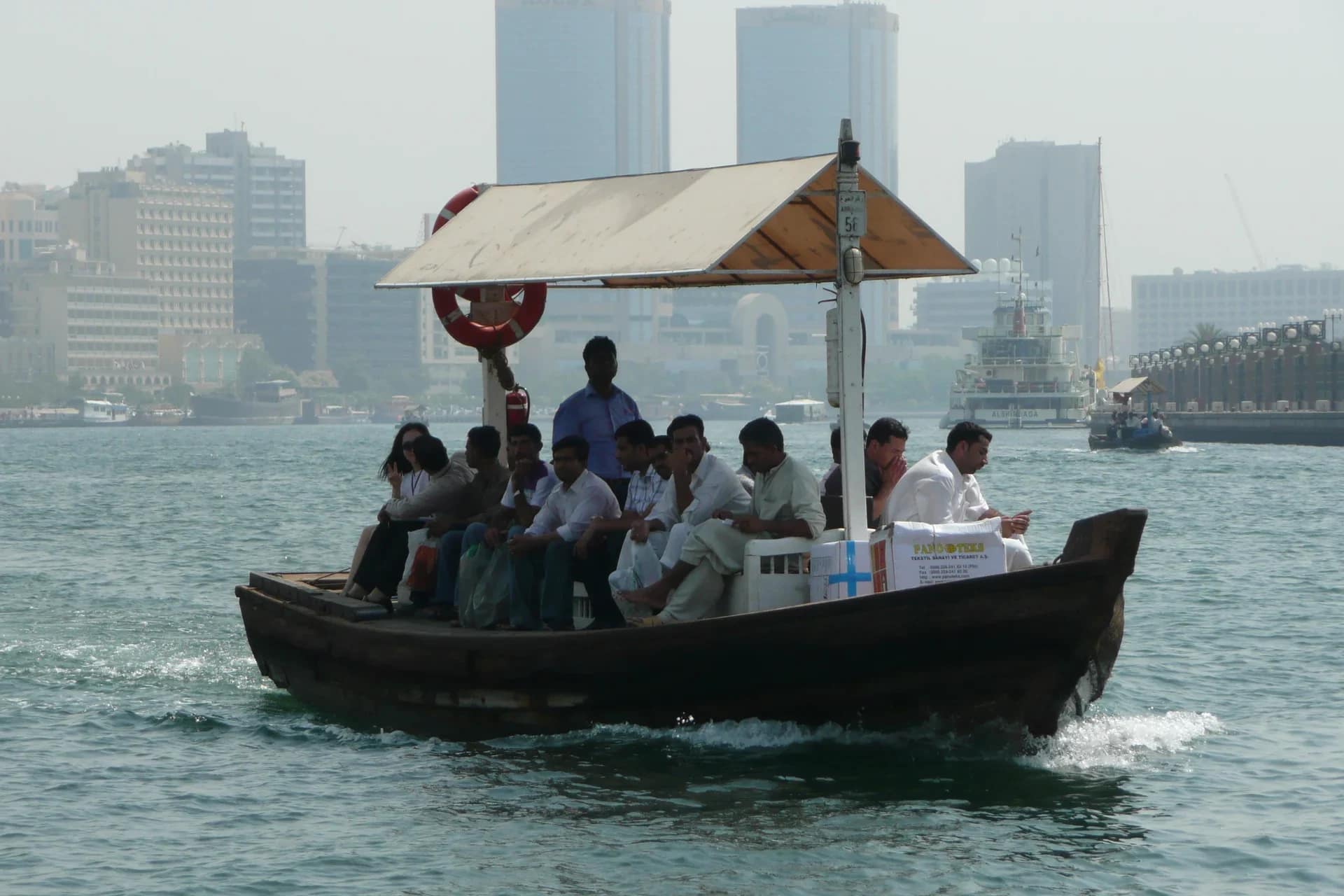 Buying Property in Dubai: The Complete Guide 12 Dubai travel: an abra with passengers on Dubai Creek