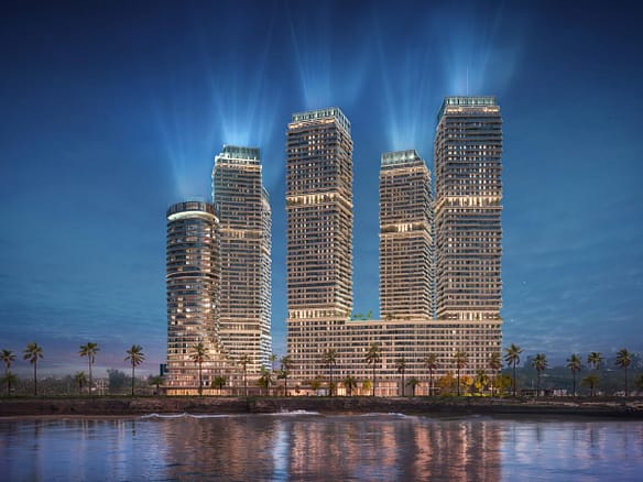 Elite Luxury Real Estate & Travel - Investimenti immobiliari di lusso internazionali & viaggi professionali 41 Coralia Santo Domingo Este — render esterno delle sette torri fronte oceano del progetto