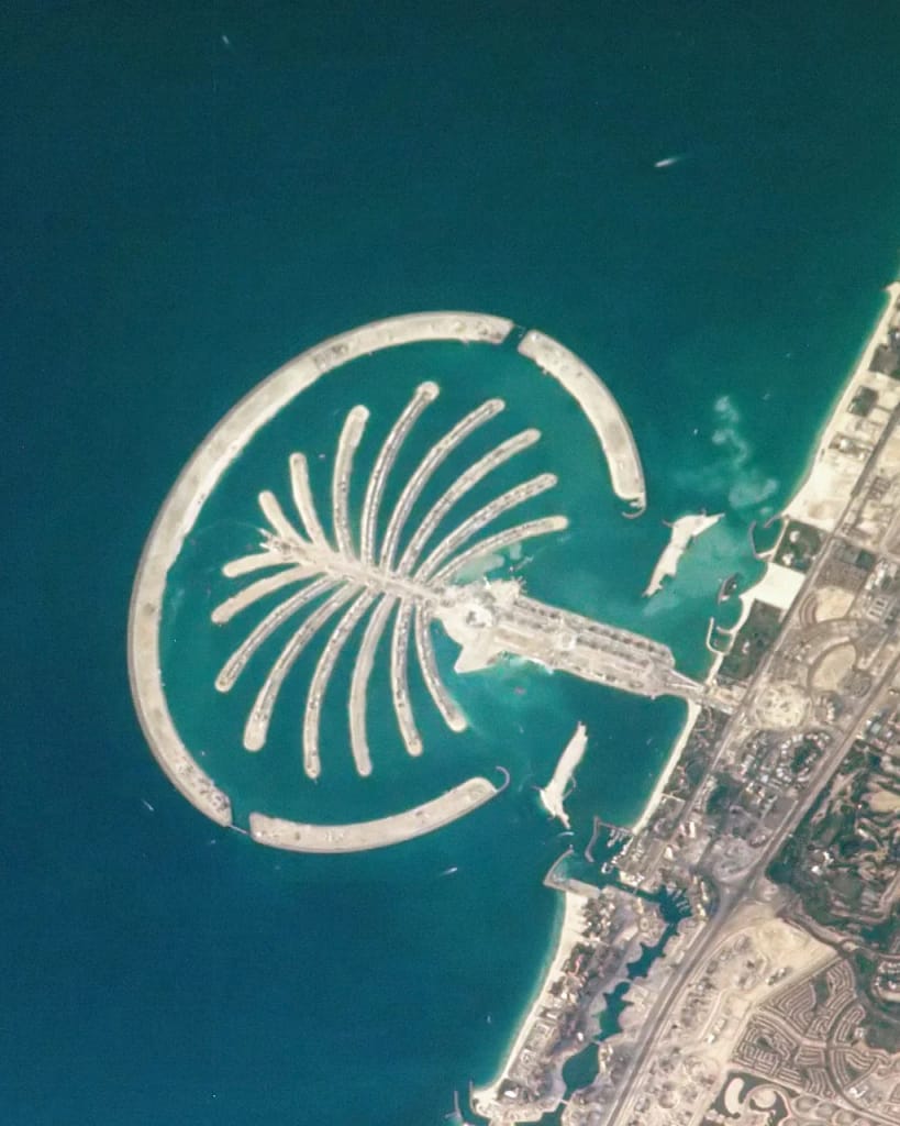 Buy off-plan property in Dubai: 10 checks before you sign 1 Buy off-plan property in Dubai: Palm Jumeirah seen from space