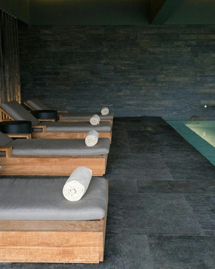 Home Spa: Sauna, Steam, Water and Rest 2 Home spa: loungers in the relaxation area next to the indoor pool (illustrative photo)