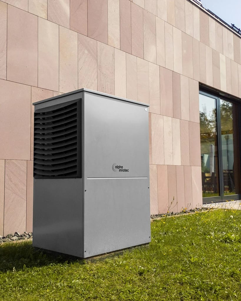 Mechanical Ventilation — Energy, Air and Water 12 Mechanical ventilation and heat pump: outdoor unit next to a modern facade (illustrative photo)